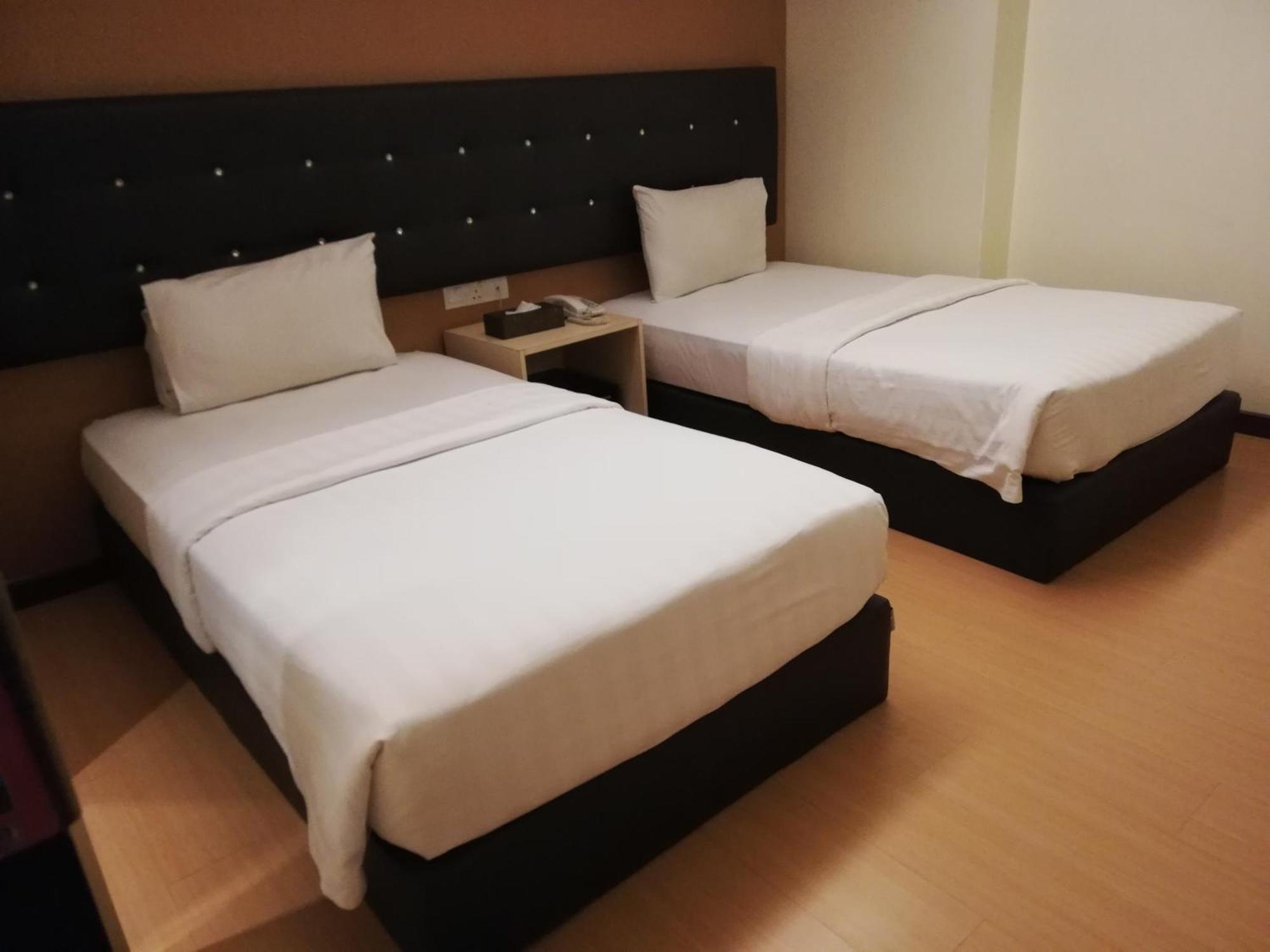 Ease Hotel Кота-Кинабалу Экстерьер фото