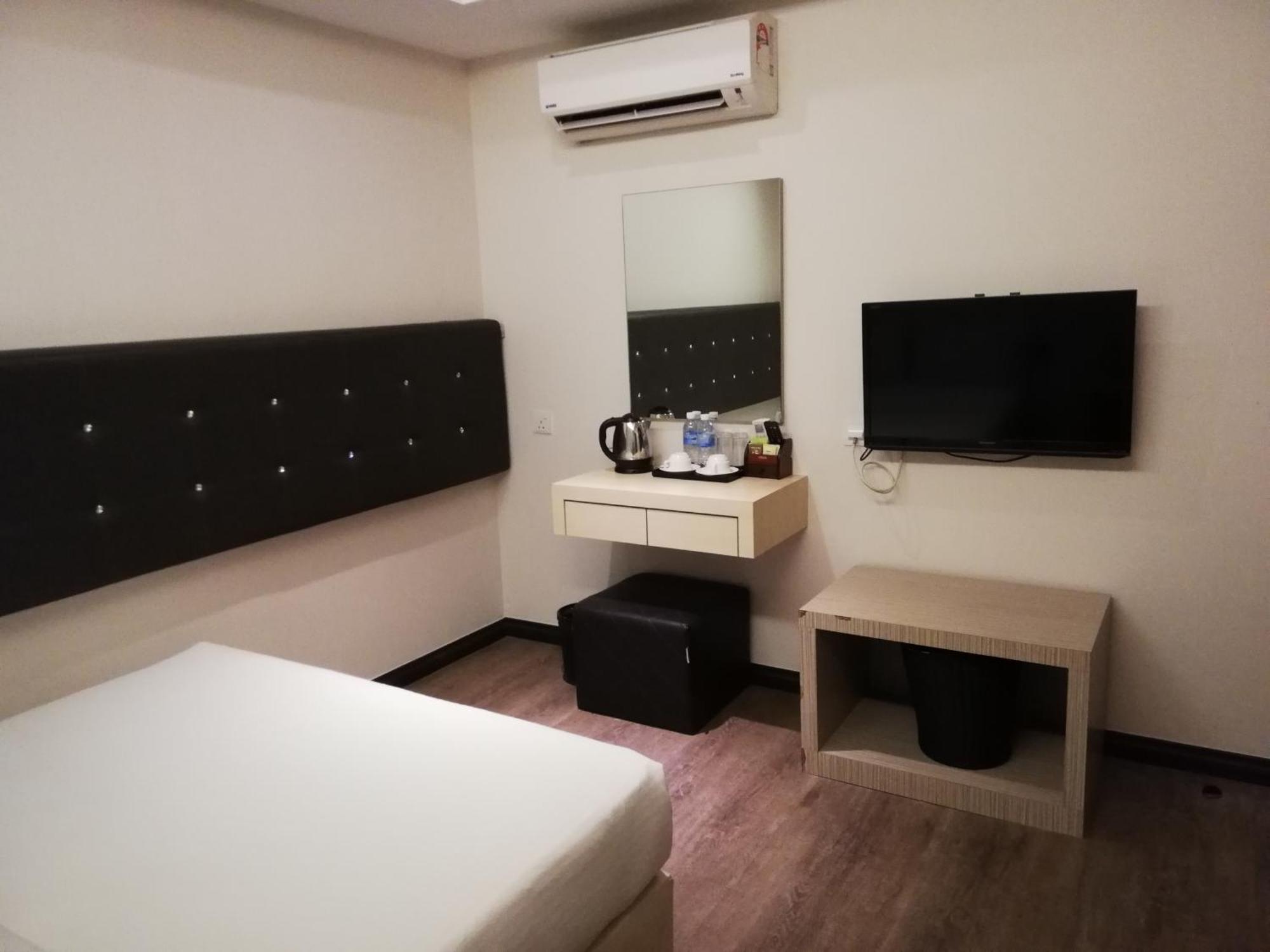 Ease Hotel Кота-Кинабалу Экстерьер фото
