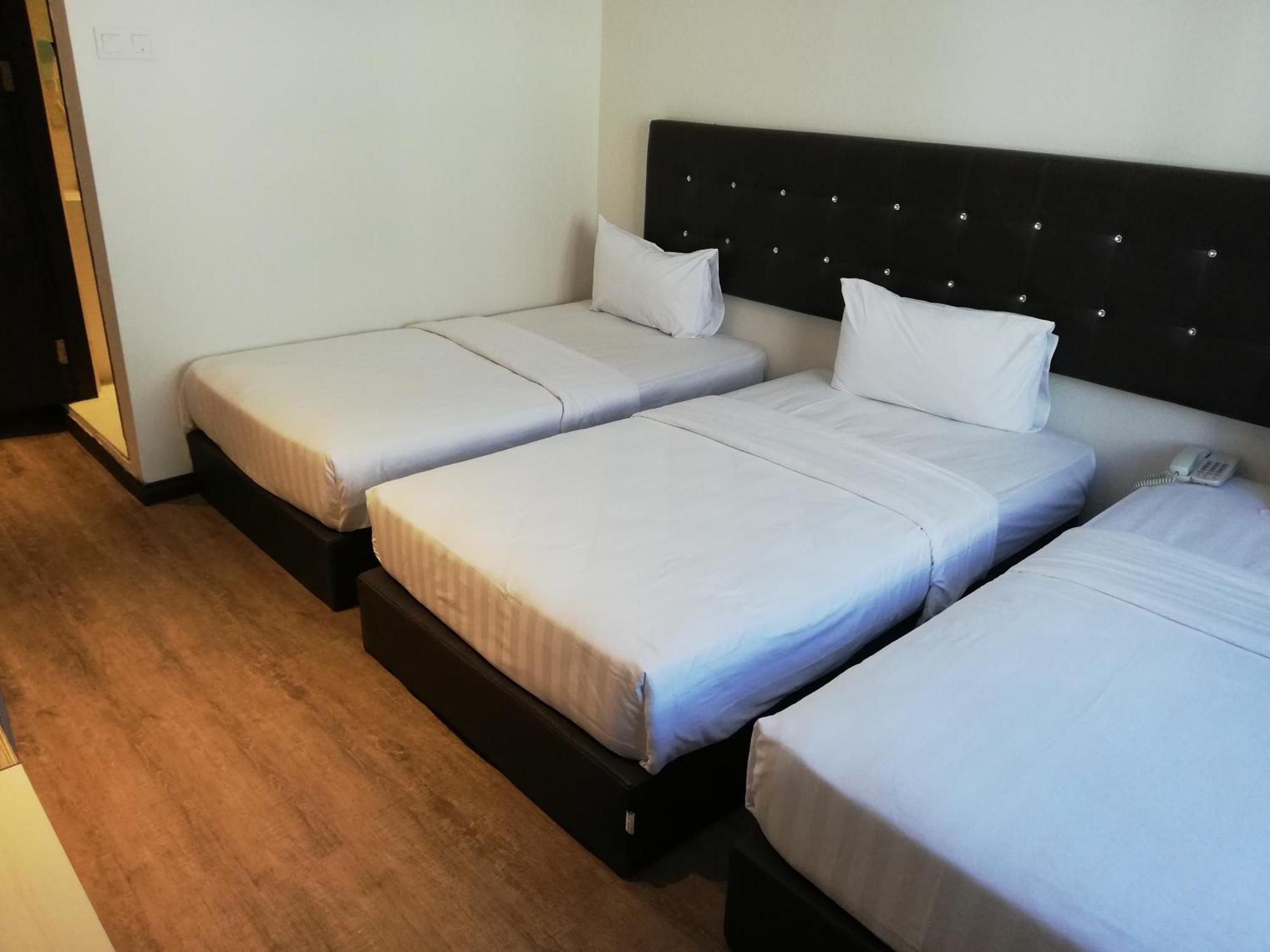 Ease Hotel Кота-Кинабалу Экстерьер фото