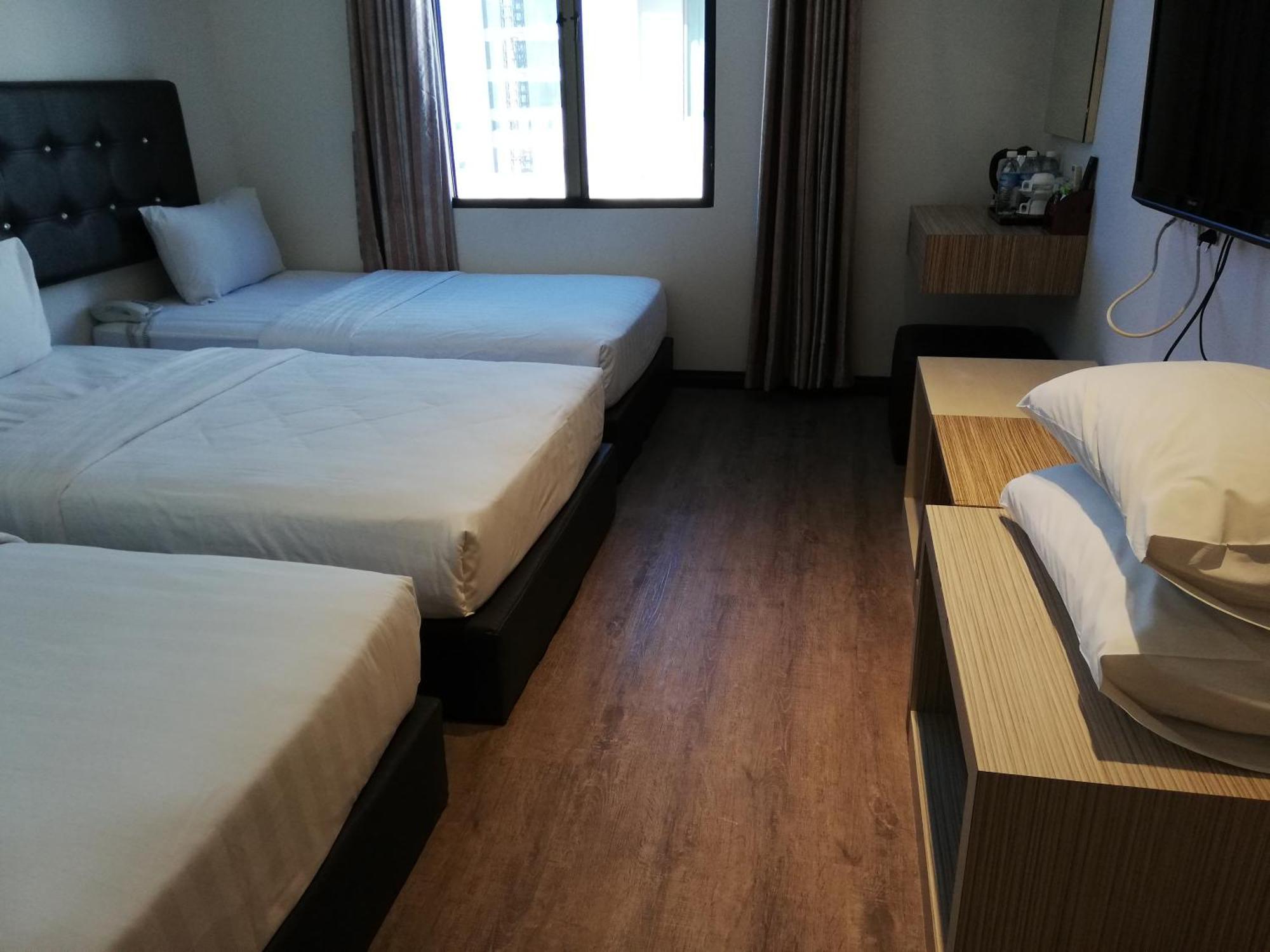 Ease Hotel Кота-Кинабалу Экстерьер фото