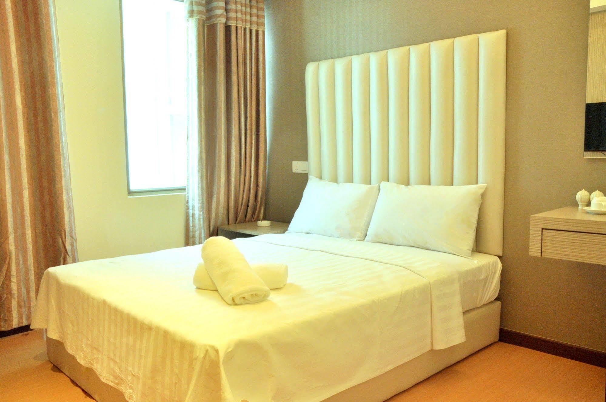 Ease Hotel Кота-Кинабалу Экстерьер фото
