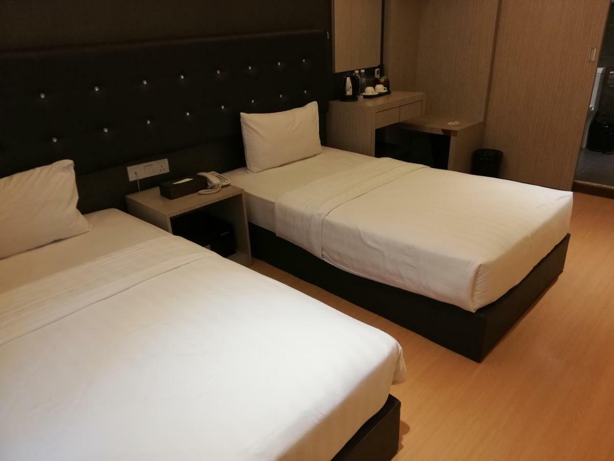Ease Hotel Кота-Кинабалу Экстерьер фото