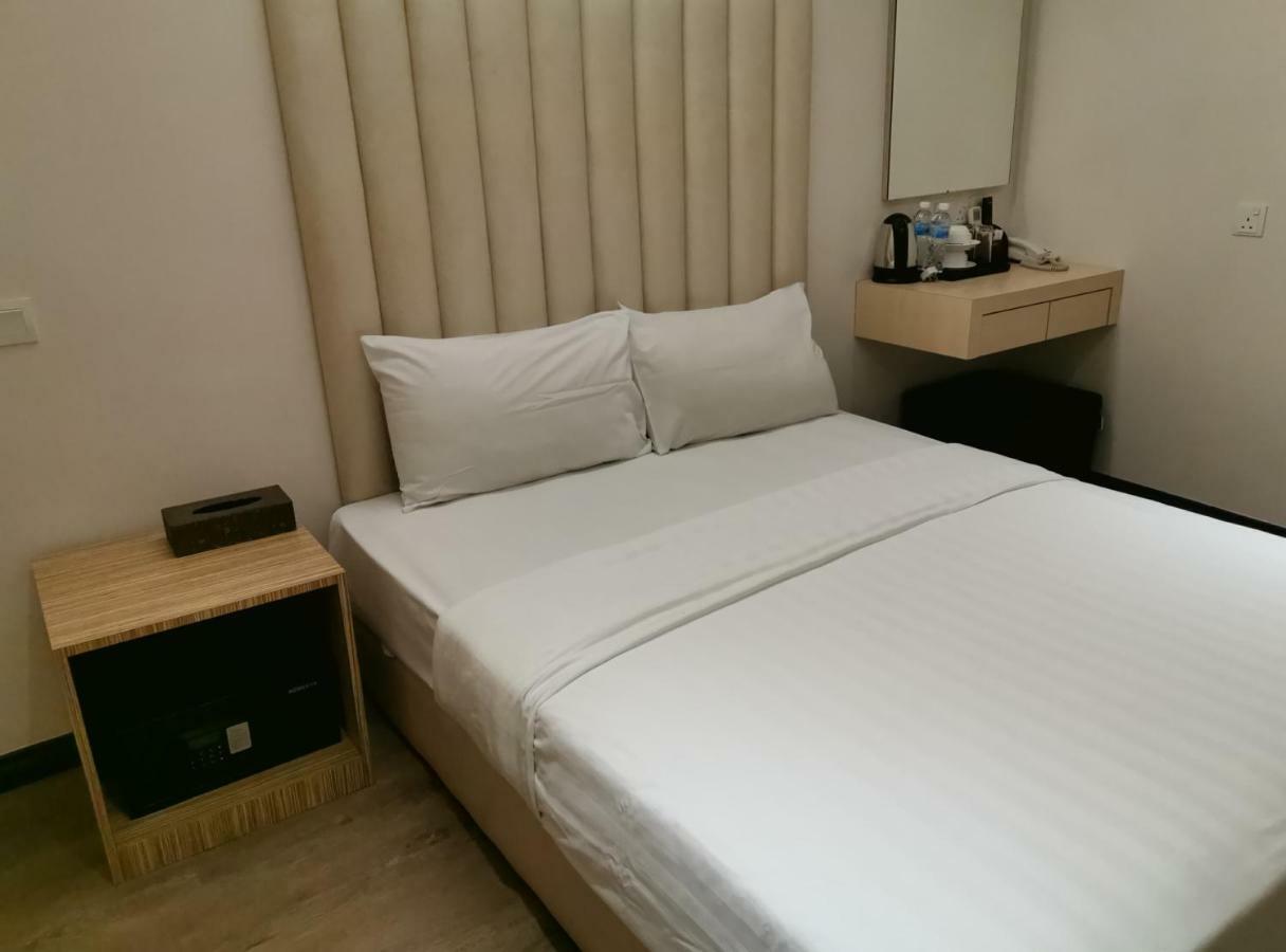 Ease Hotel Кота-Кинабалу Экстерьер фото